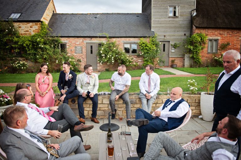 Wedding guests chatting candidly