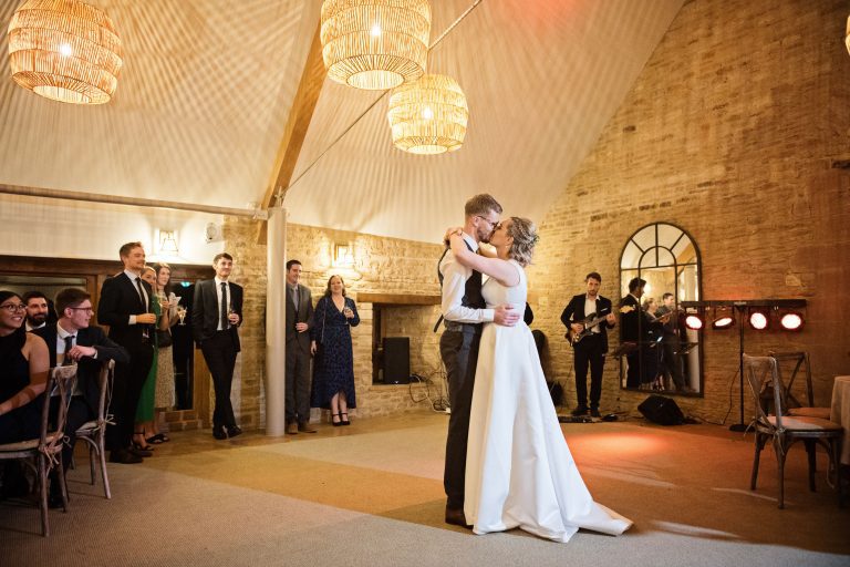 Bride and groom enjoy their first dance at Calcot Manor.