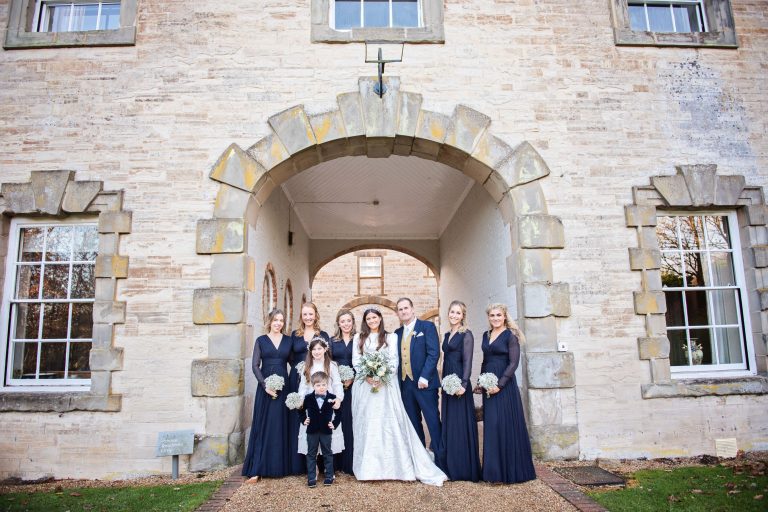 Team bride gather before the wedding ceremony at Compton Verney