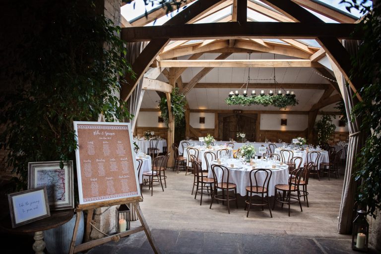 Wedding breakfast set up at Cripps Barn. Rustic yet modern.