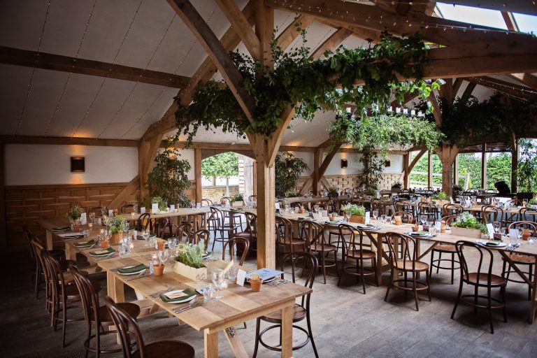Wedding breakfast set up at Cripps Barn. Rustic yet modern.