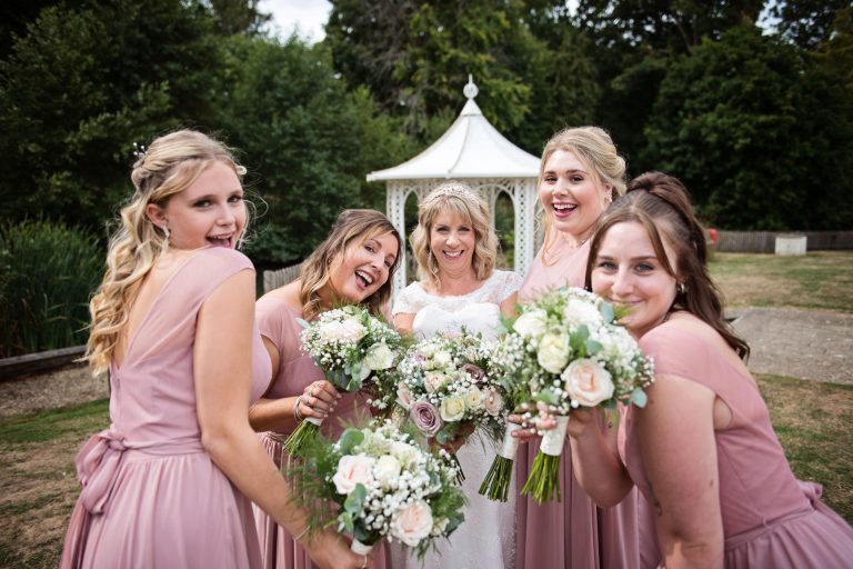 Bridesmaids smiling and laughing