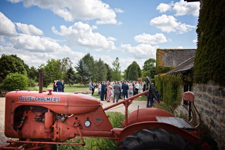 Huntsmill's Allis Chalmers tractor sitting proud whilst guests enjoy the wedding reception.