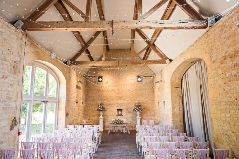 The ceremony barn at Lapstone Barn decorated for a wedding.