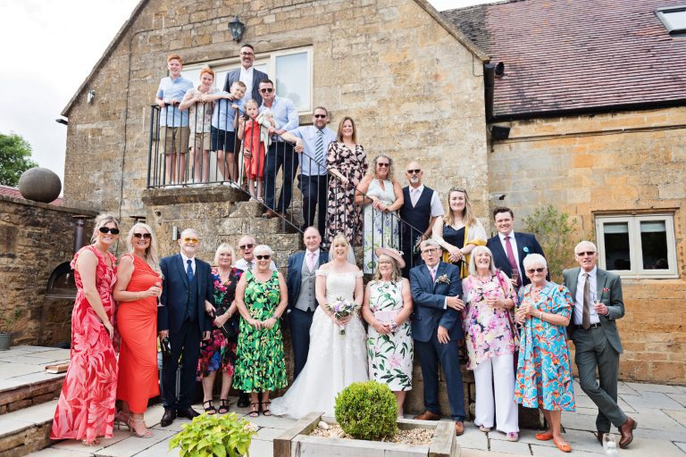 Fun wedding group shot at Lapstone Barn using the stairs.