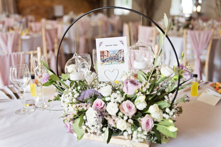 Wedding table flowers for the table decorations at wedding breakfast.