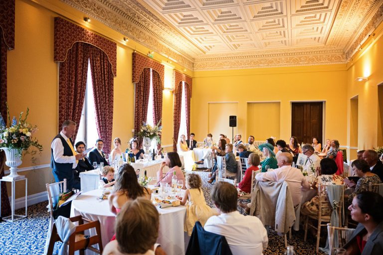 Speeches taking place during wedding breakfast.