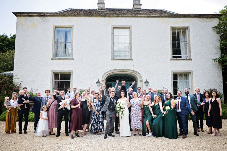 Wedding guests cheer in front of Matara.