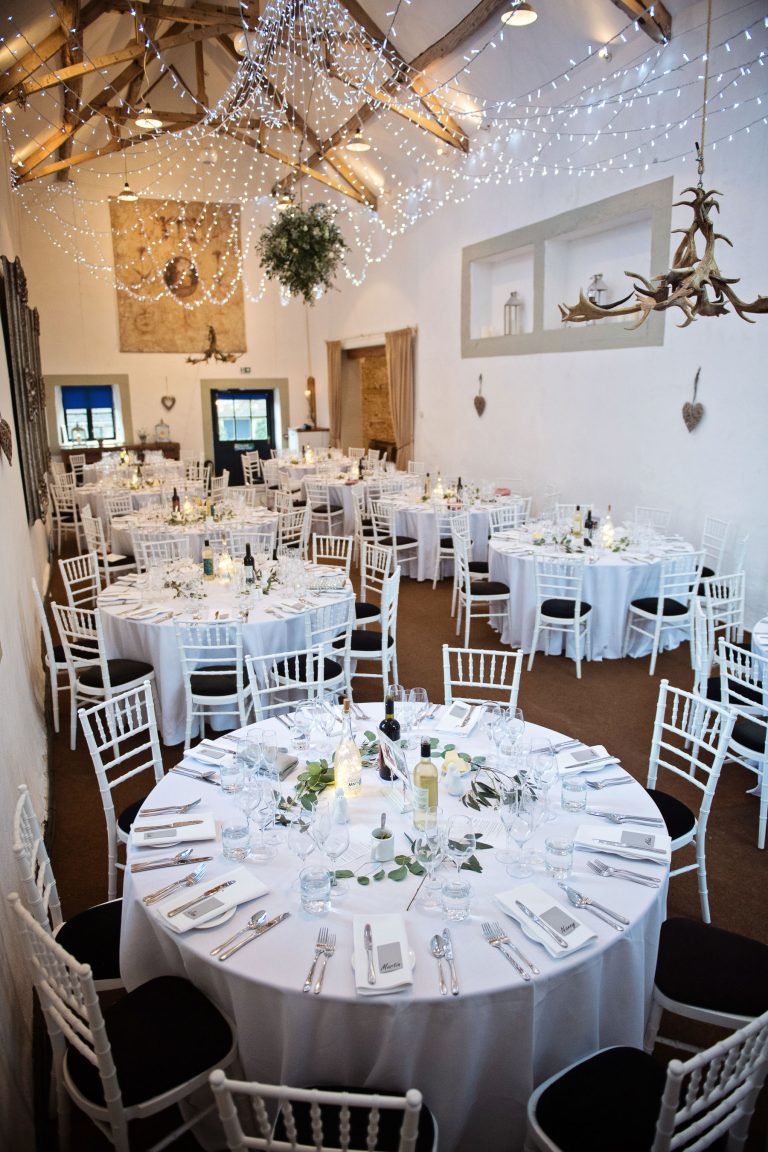 Wedding breakfast set up in the barn.