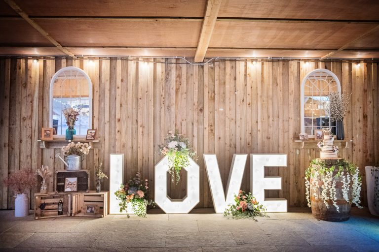 LOVE letters sign in a wedding barn