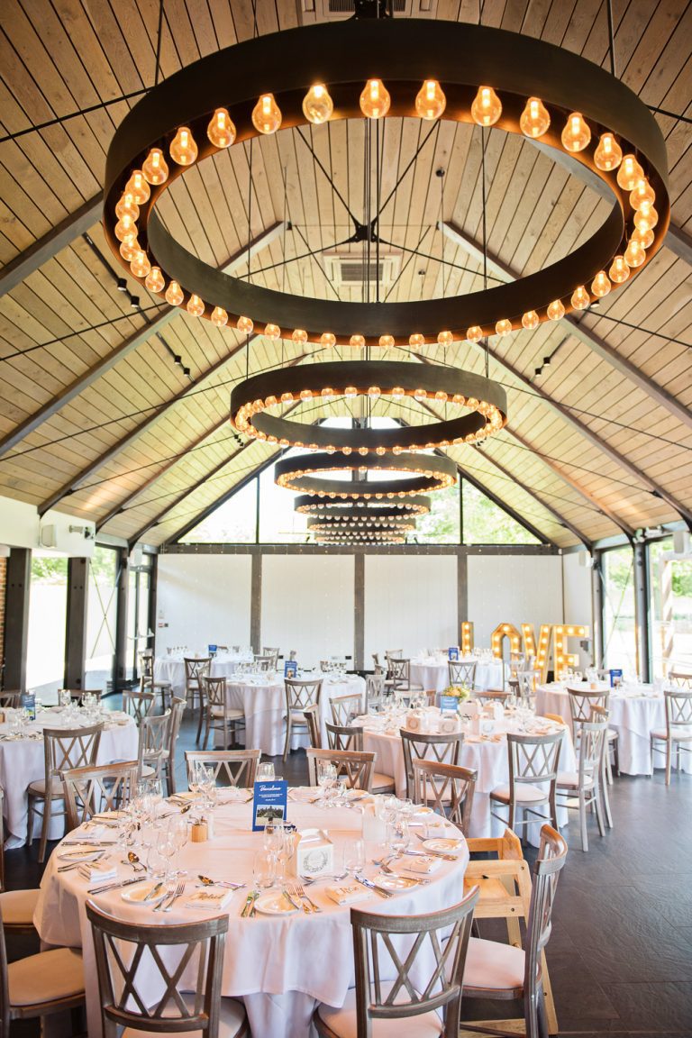 Portrait photo of wedding breakfast layout at Syrencot.