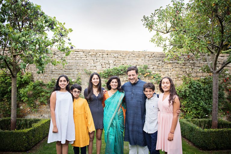Formal yet relaxed photo of wedding guests.