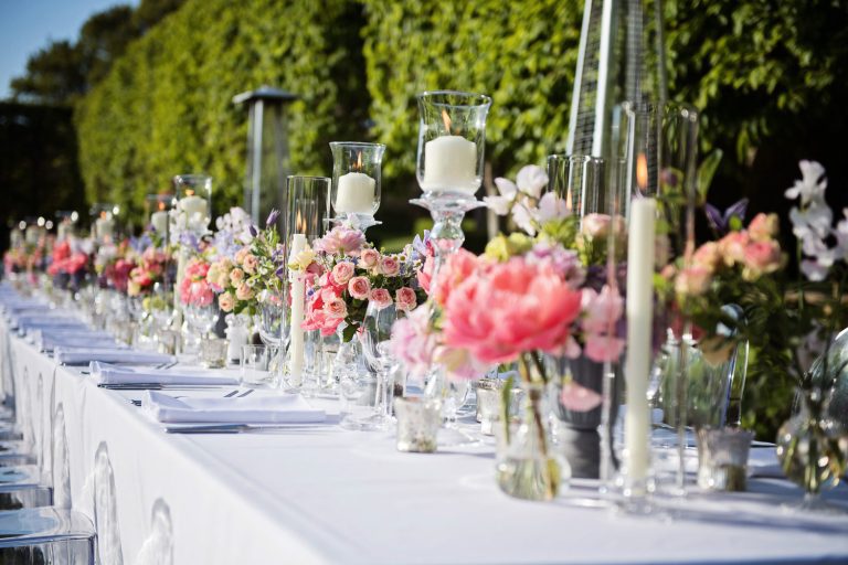 Outdoor wedding breakfast table set up. Wedding table details.