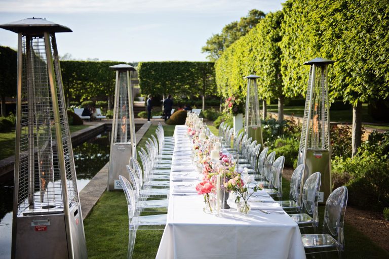 Outdoor wedding breakfast table set up.