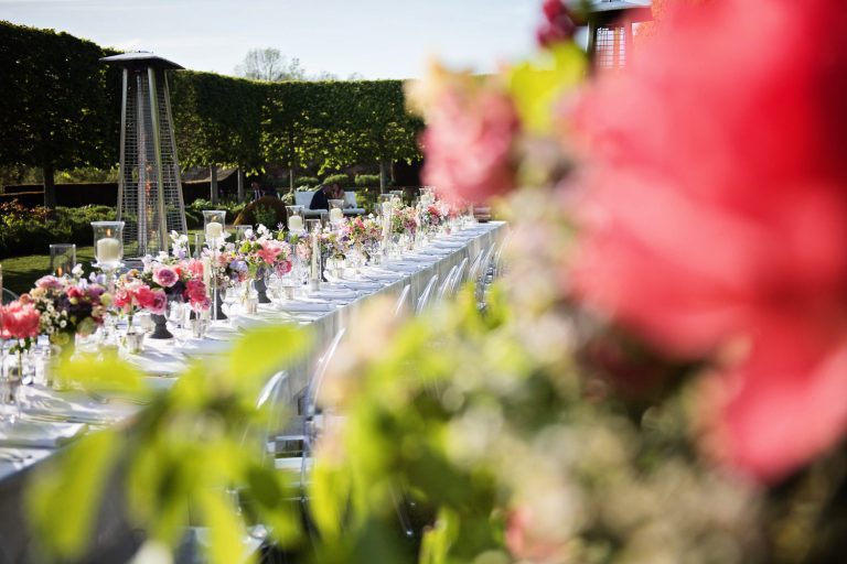 Outdoor wedding breakfast table set up.