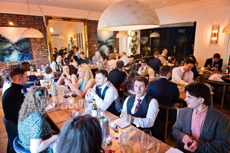 Wedding breakfast in full swing at a wedding Clifton, Bristol.