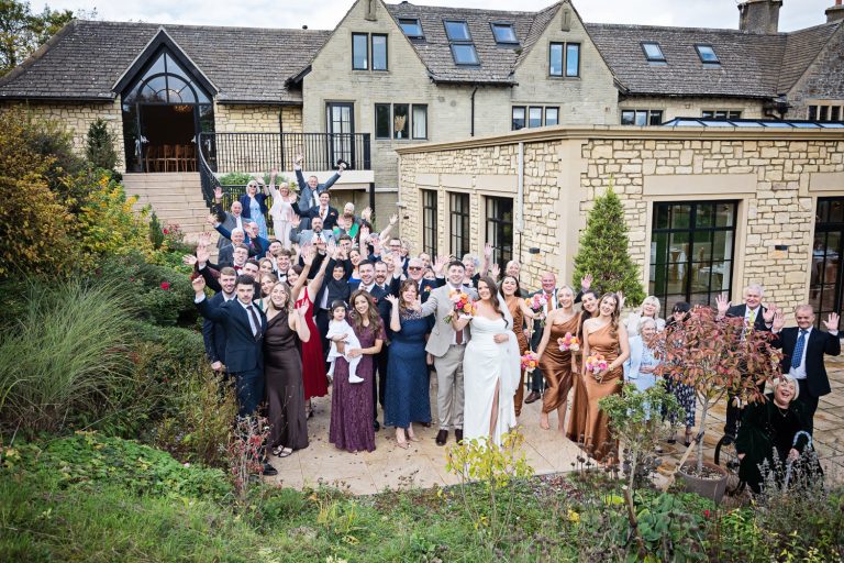 Large group shot of a wedding party at The Pear Tree, Purton.