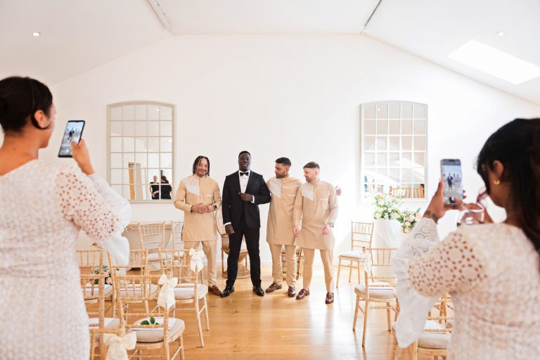 Team groom waiting for the bride and having a few pictures taken.