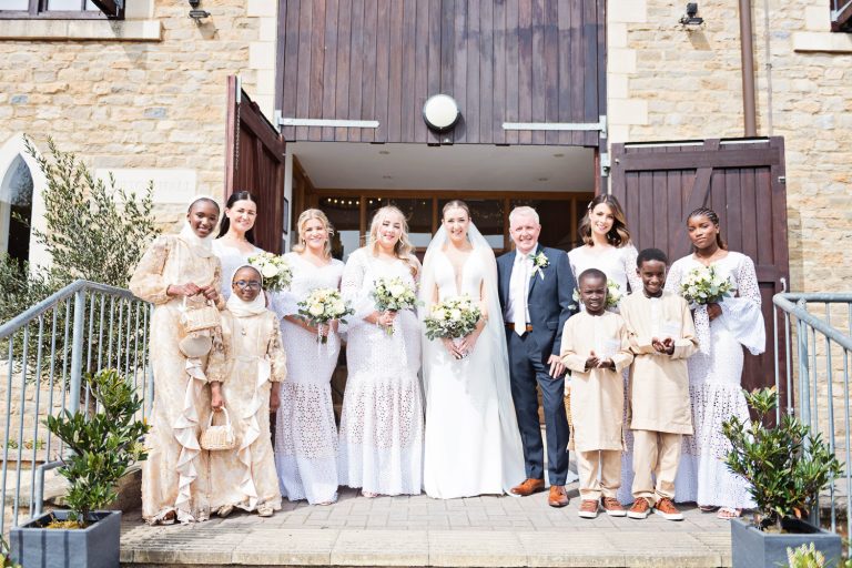 Team bride outside the front of Worton Hall.