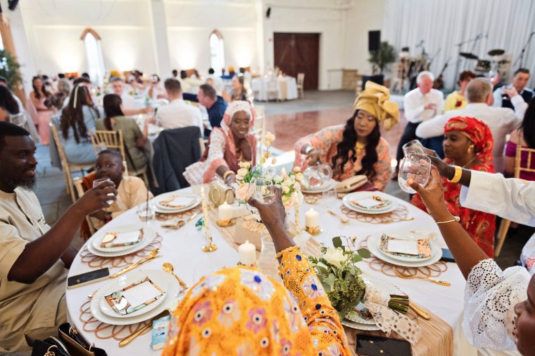 Guests raise a glass.