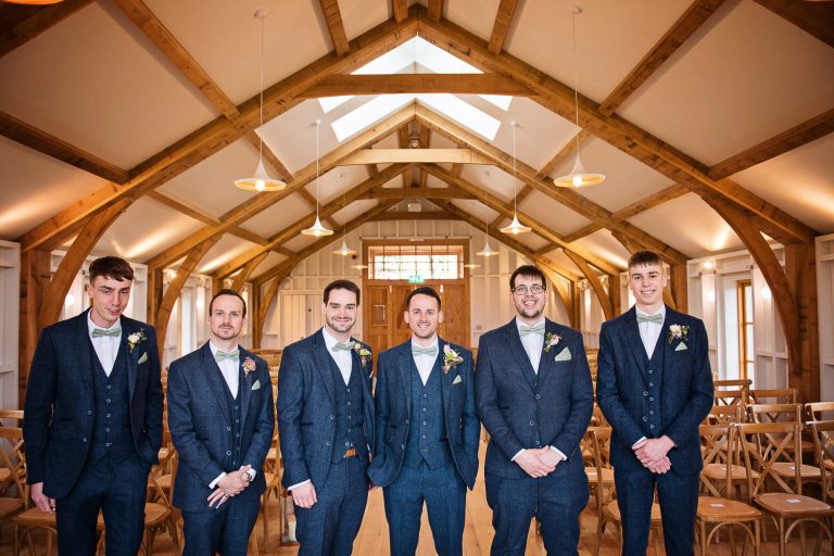Groomsmen line up before the ceremony.