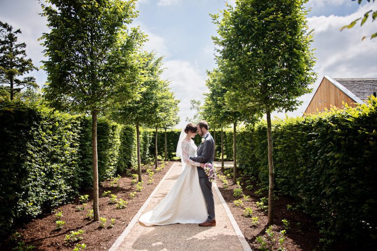 Bride and groom grab a moment together at Hyde House.