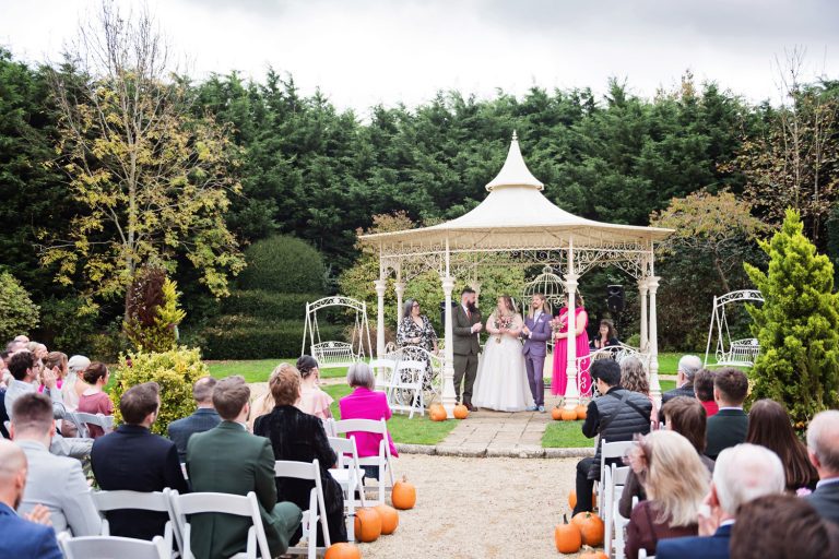Outdoor wedding ceremony at Manor By The Lake.