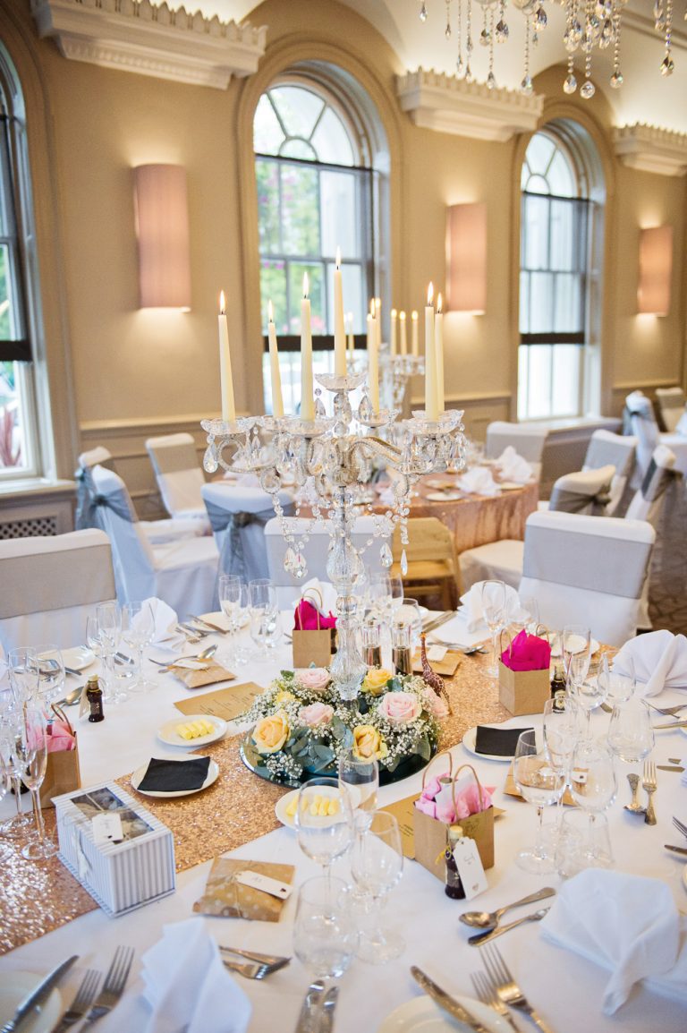 Reflection from a mirror of guests having a good time at The Queens Hotel, Cheltneham.
