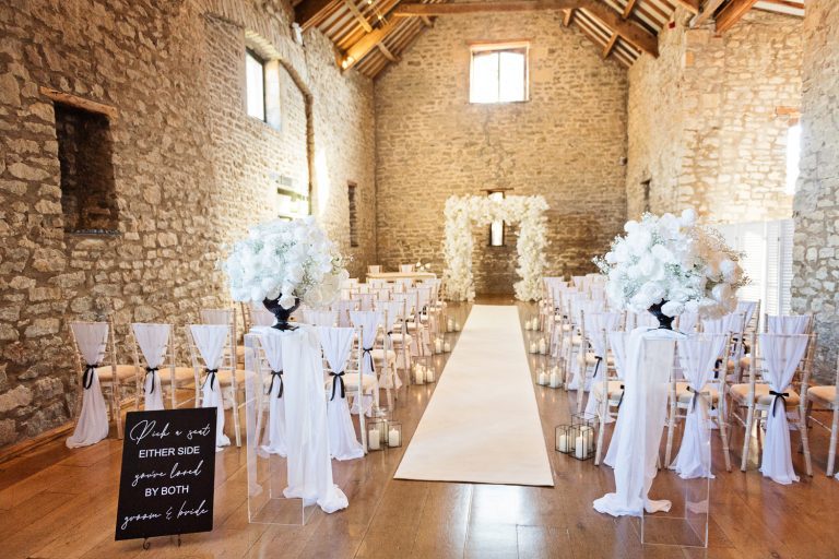 Indoor wedding ceremony set up at Priston Mill