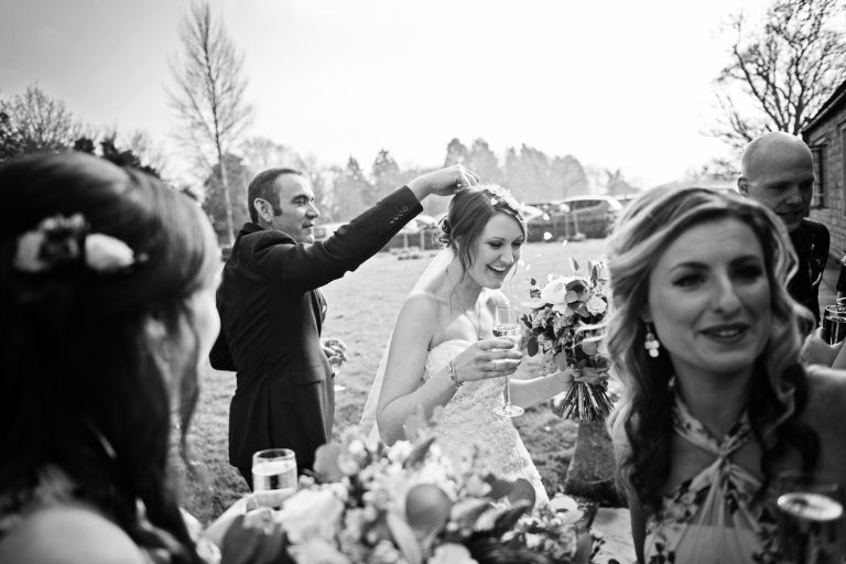 Candid wedding photos at The Slaughters Country Inn (B&W image)