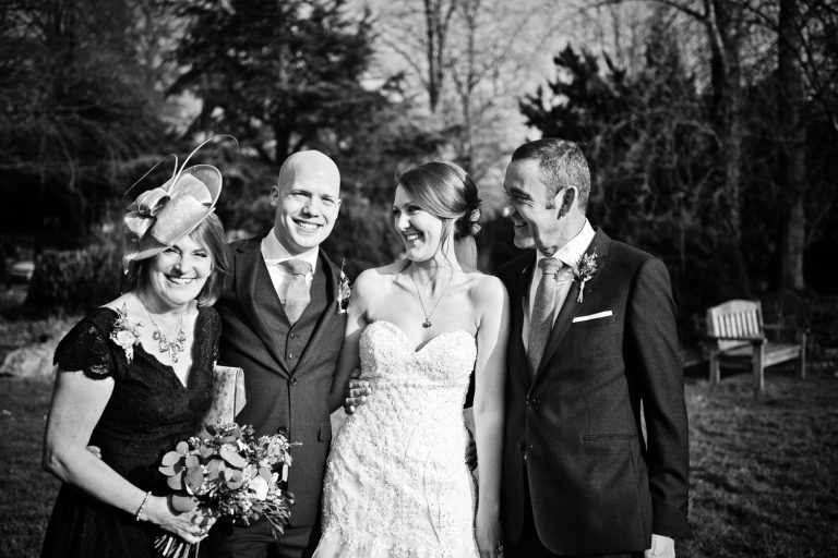 Candid family group photo at The Slaughters Country Inn (B&W)