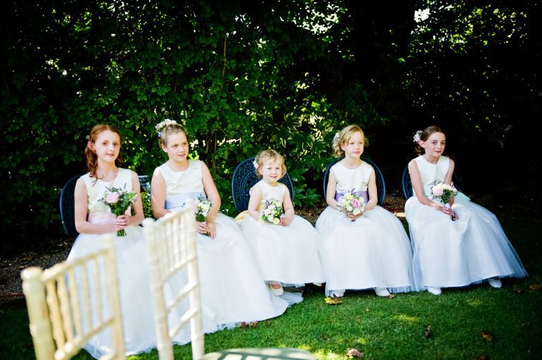 Flower girls sitting down.
