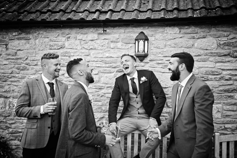 Documentary Gloucestershire wedding photographer Kingscote Barn