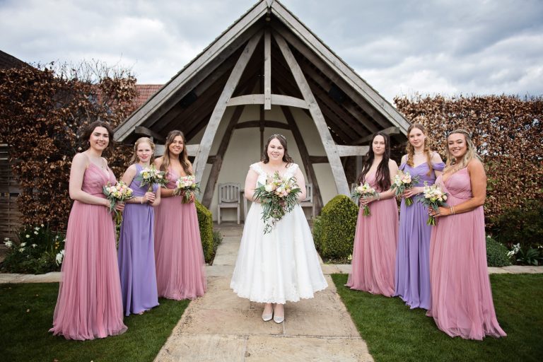 Bride with her colourful bridesmaids.