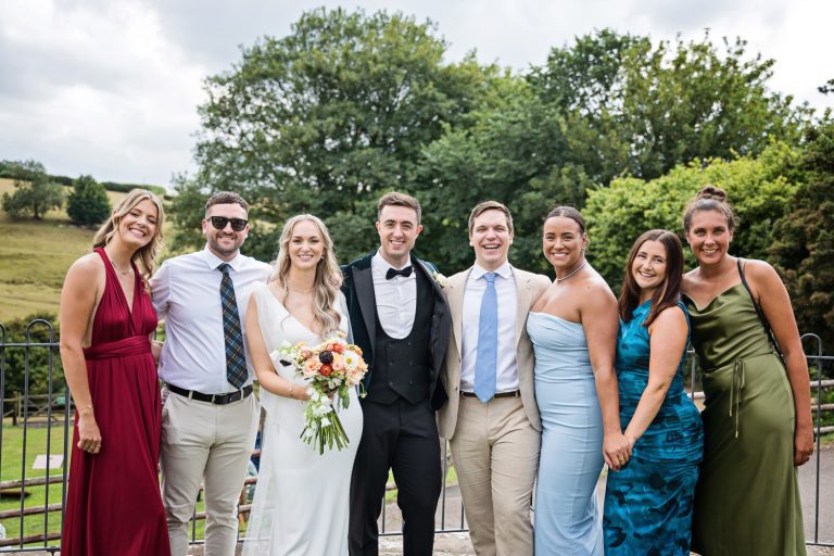 Relaxed group photo of wedding guests