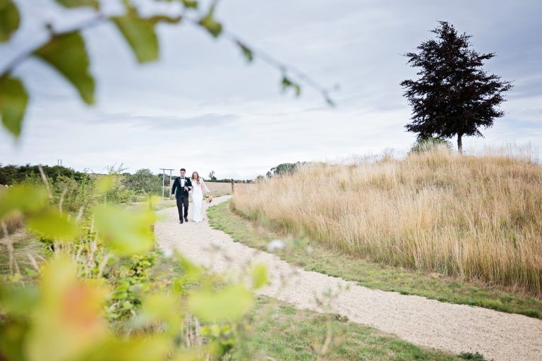 Bride and groom grab a moment together.