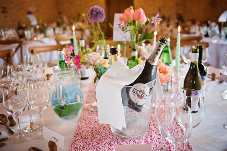 Wedding table set up by Strawberry Fields at Kingscote Barn.