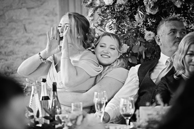 Bridesmaids heckling during wedding speeches.