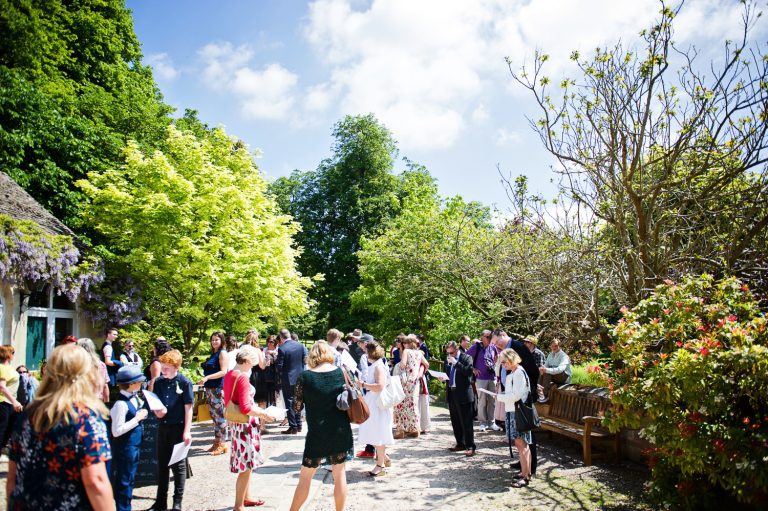 Candid wedding moments at Painswick Rococo Garden