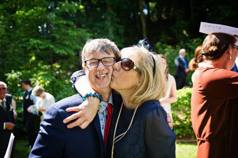 Candid wedding moments at Painswick Rococo Garden