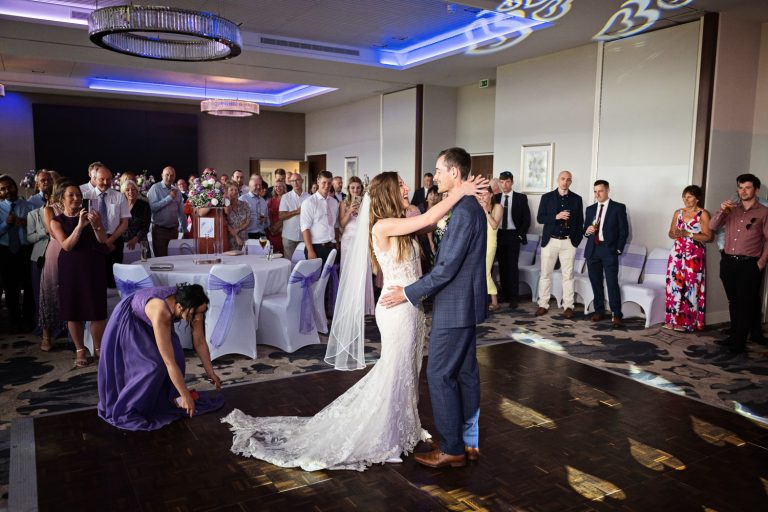 Bride and groom kiss during their first dance at Tewkesbury Park